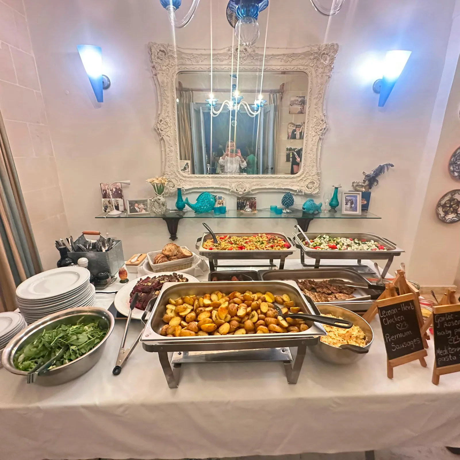 Private BBQ buffet with rosemary baby potatoes, grilled meats and fresh salads
