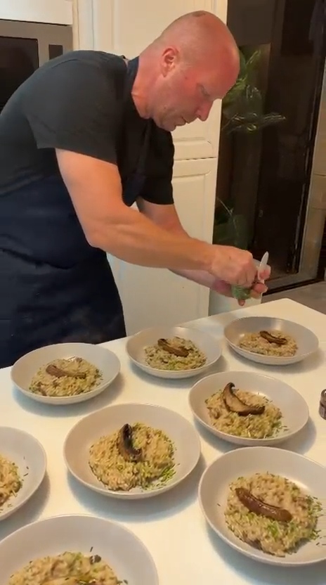 Chef Laszlo plating porcini and black truffle risotto for the birthday dinner