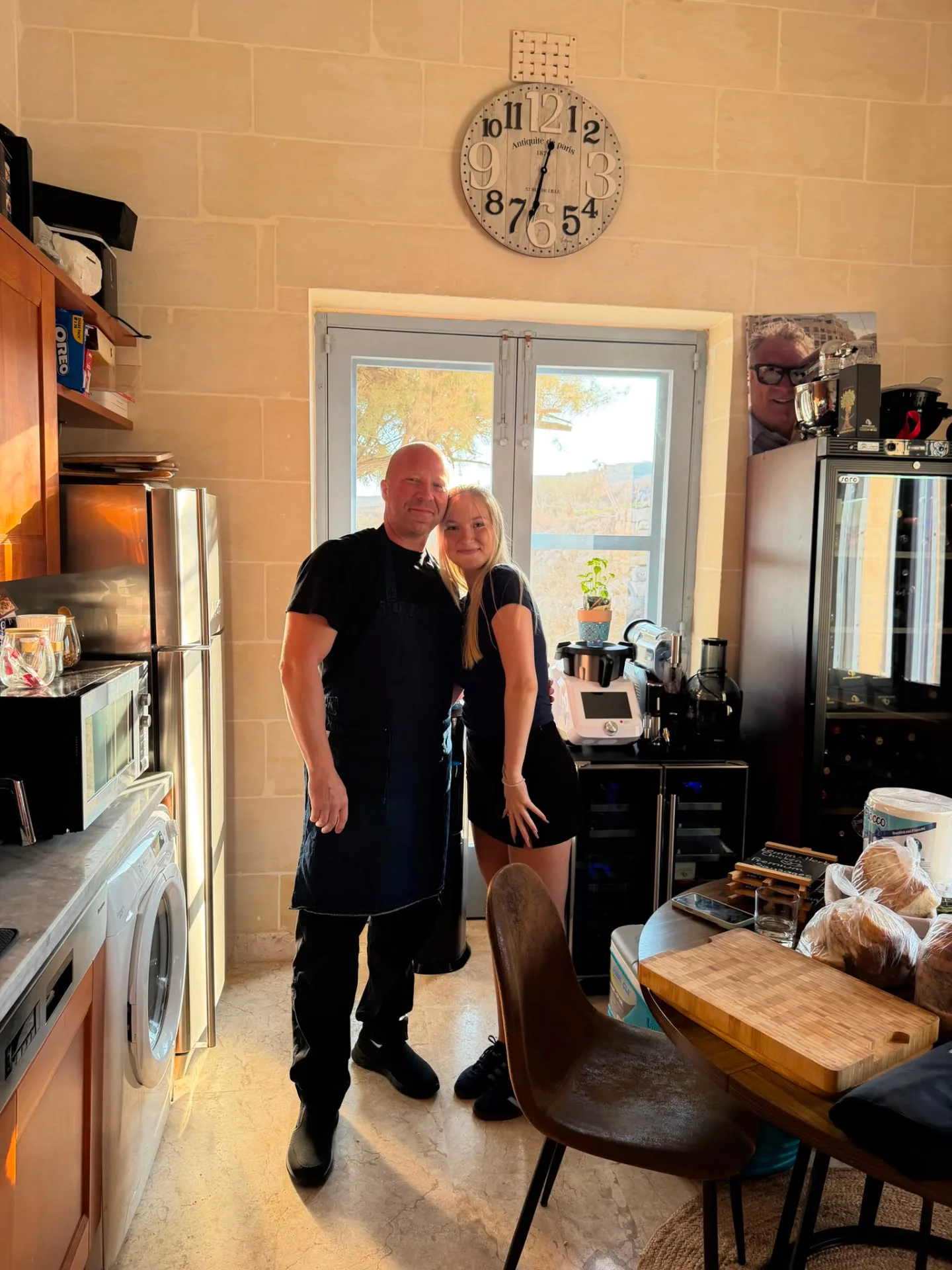 Chef Laszlo and his kitchen assistant preparing service in the villa kitchen