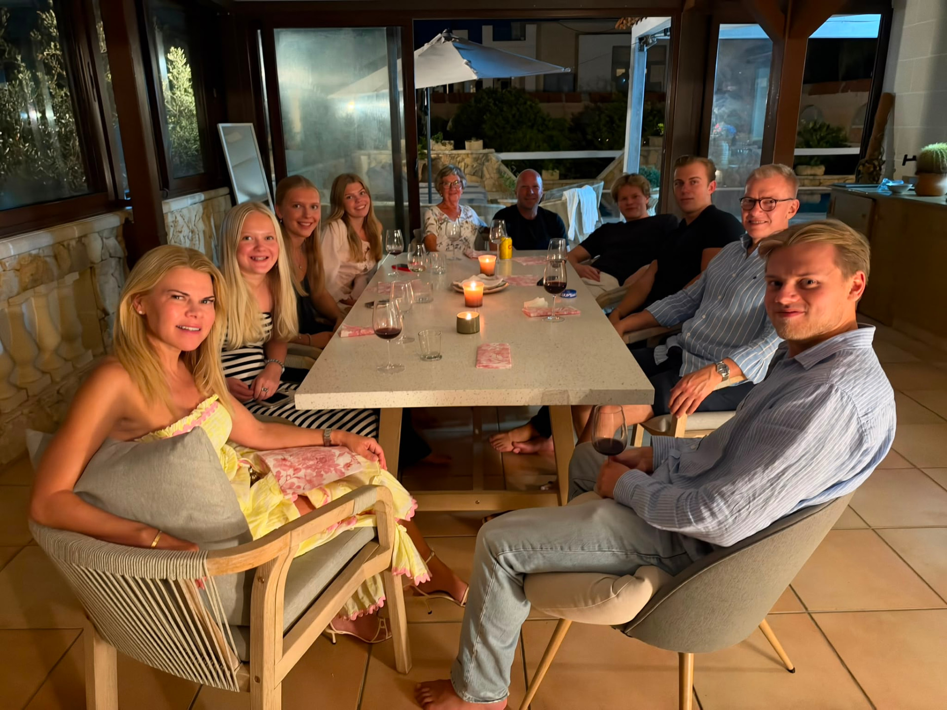 Helen and her family gathered around the candlelit dinner table